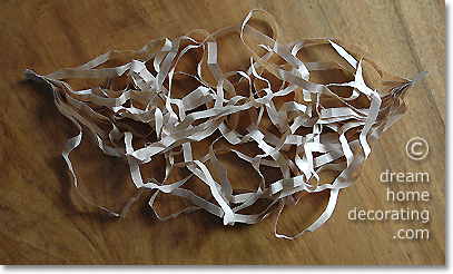 crushed paper strips to make a nest