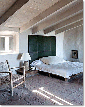contemporary rustic French bedroom in charcoal, white and terra cotta