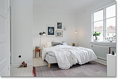 mostly white bedroom in sweden