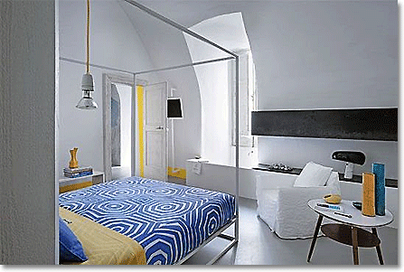 elegant contemporary Italian bedroom in white, yellow and blue