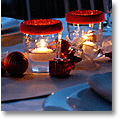 christmas table setting with recycled jam jar lighting