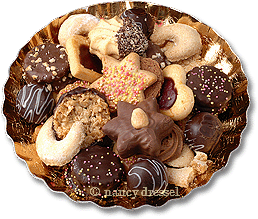 Christmas cookies on an ornate paper plate