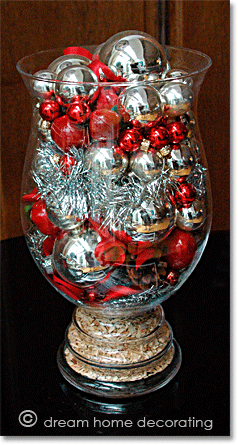 red and silver xmas balls in a glass bowl