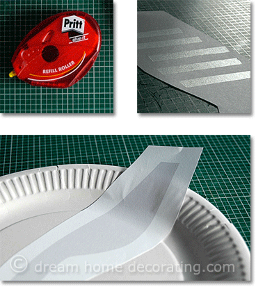 applying letter stencils to paper plates