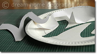 cutting letters out of paper plates