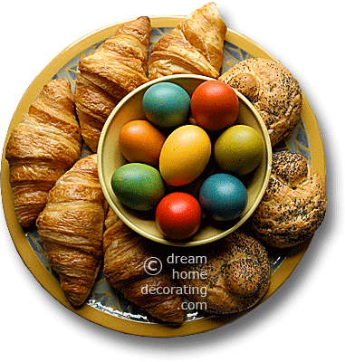 Easter table decoration: Provence-style cemterpiece with Easter eggs surrounded by bread rolls
