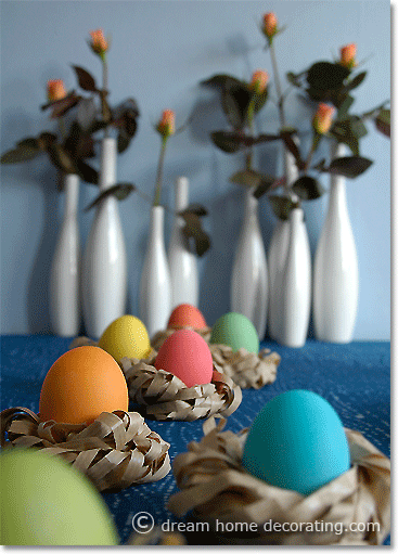 Easter table decoration with shredded-paper Easter nests