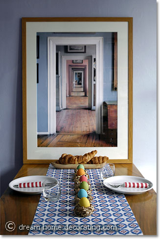 Easter egg centerpiece with hand-dyed Easter eggs in mini paper nests