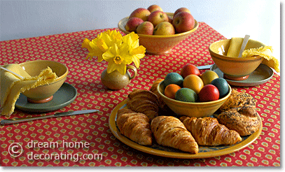 Simple decoration for a 'French' style Easter table: Easter eggs and French bread rolls.