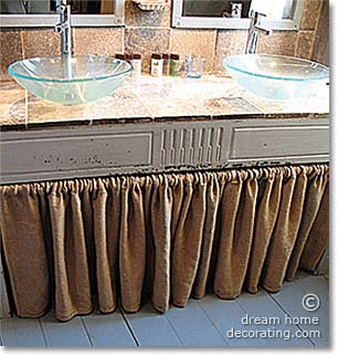 rustic tiles and glass washbasins in a Provencal bathroom