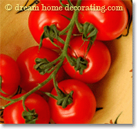 fresh tomatoes in a yellow bowl