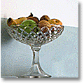footed glass bowl with fruit