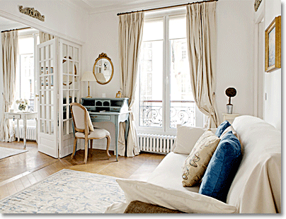 Parisian living room with antique white furniture