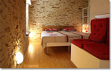 warm rustic bedroom, central France