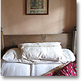 italian country bedroom with pale pink walls