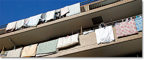 futons airing in traditional Japanese homes