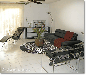 round b/w area rug under antique Japanese drum as a coffee table