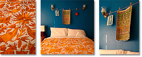 Prussian blue and orange color scheme for a bedroom