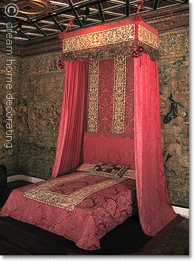 red half-tester bed in Chenonceau castle, France