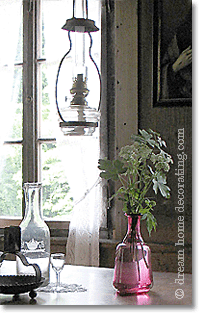 rustic lighting: glass petroleum lamp