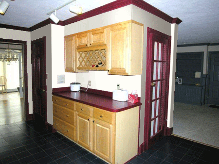 kitchen with red wood worktops and trims