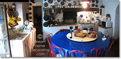 Vintage Tuscan farmhouse kitchen with wood-burning oven and stone sink, Province of Siena, Tuscany, Italy