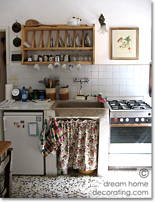 Tuscan townhouse kitchen with terrazzo flooring and stone sink, Province of Siena, Tuscany, Italy