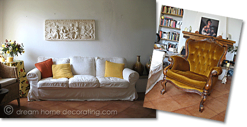 living room in a Tuscan podere with a white contemporary sofa and antique poltrona chair, Tuscany, Italy