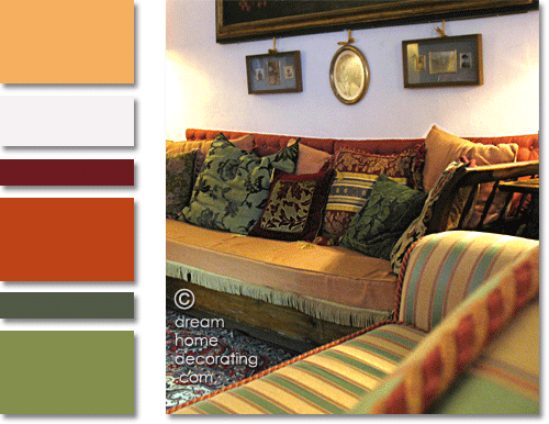 Tuscan palazzo living room in warm greens, yellows and reds, Volterra, Tuscany, Italy