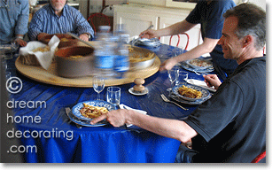 rustic Tuscan dining table with blue transferware dishes