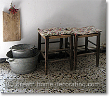 old stools in a townhouse kitchen, Tuscany
