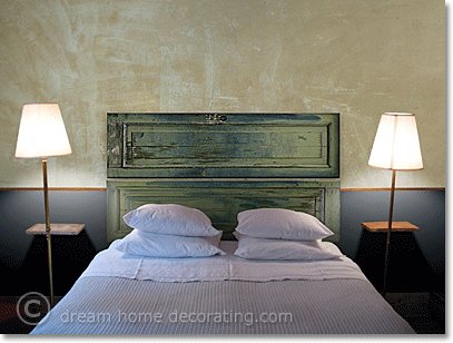 green shabby headboard in grungy bedroom