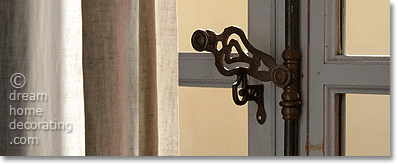 hand-forged hardware on a French country window