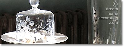 cut-glass cloche on a side table, French provincial house