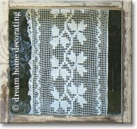 antique filet lace curtain in a Swiss chalet