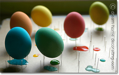 drying rack for freshly dyed easter eggs, made of corrugated cardboard and pins