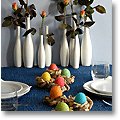 Easter nests on a blue dinner table