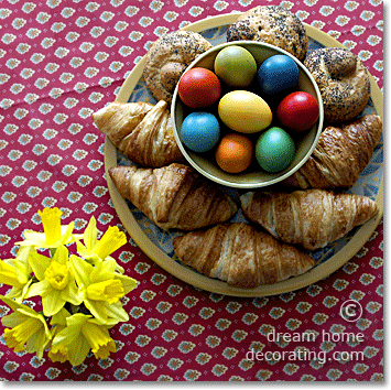 Simple decoration for a 'French' style Easter table: Easter eggs and French bread rolls.