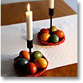 Easter table decoration with candlesticks and Easter eggs