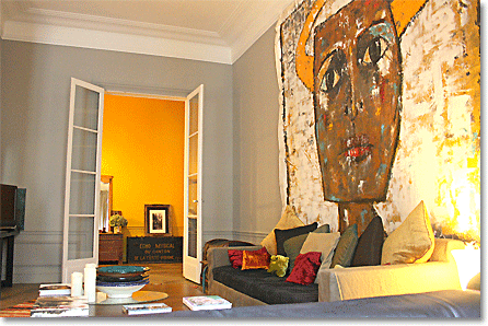 french living room with oversized wall art