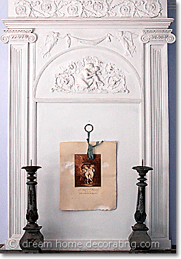 french stucco mantelpiece with antique print