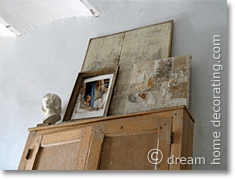 art stacked on top of a built-in cupboard, Provence