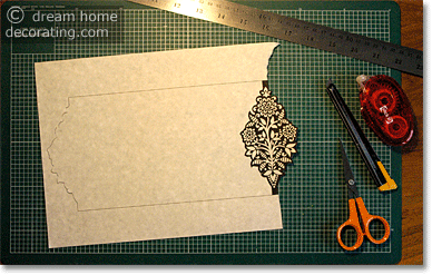 cutting out the paper lantern pattern