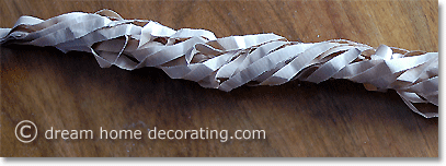 Creating a nest from crushed paper strips