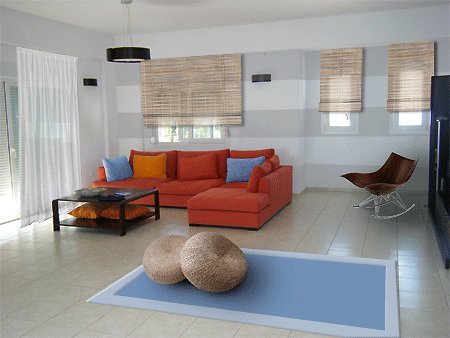 livingroom colors in Greece: white, straw, burnt orange, grey and pale blue