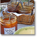 homemade jam jars on a French country breakfast table