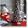 Silver walnut tabletop Christmas tree as a centerpiece for Christmas dinner