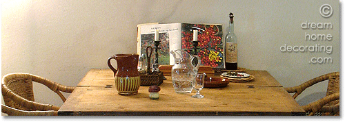 tuscan dining table with glasses and ceramic mug, rural Tuscany, Province of Siena