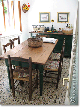 Kitchen/dining table in an old townhouse, San Gimignano, Tuscany, Italy