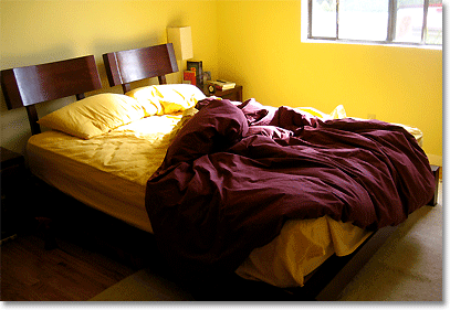 deep purple and yellow bedroom